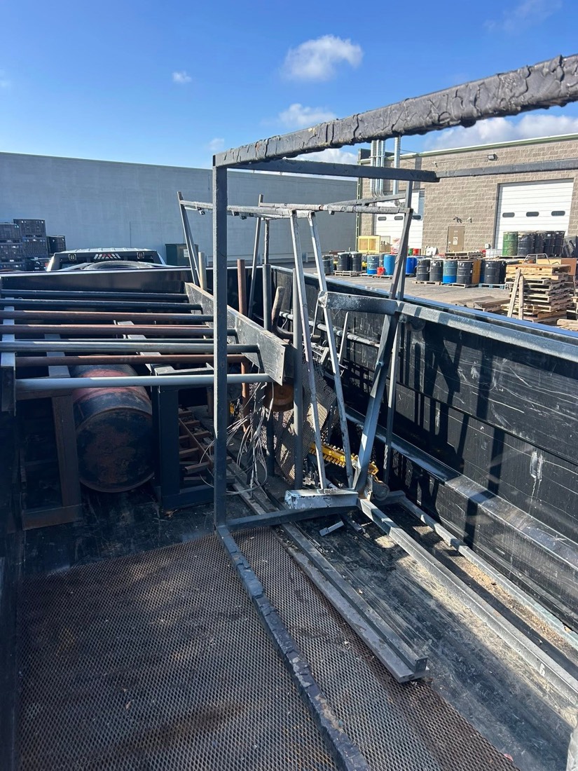 Metal frames and scrap loaded for removal